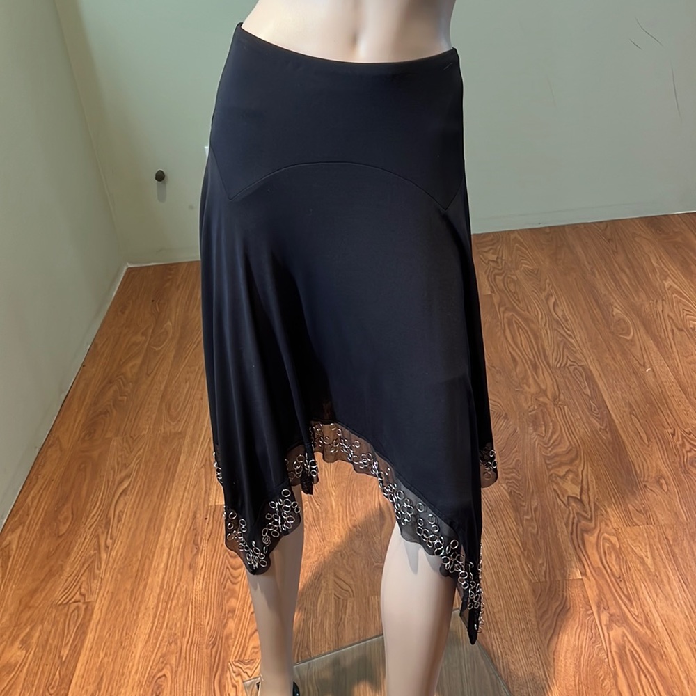 Bebe Black Skirt With Handkerchief Hem That Has Little Tiny Metal Circles Hem M